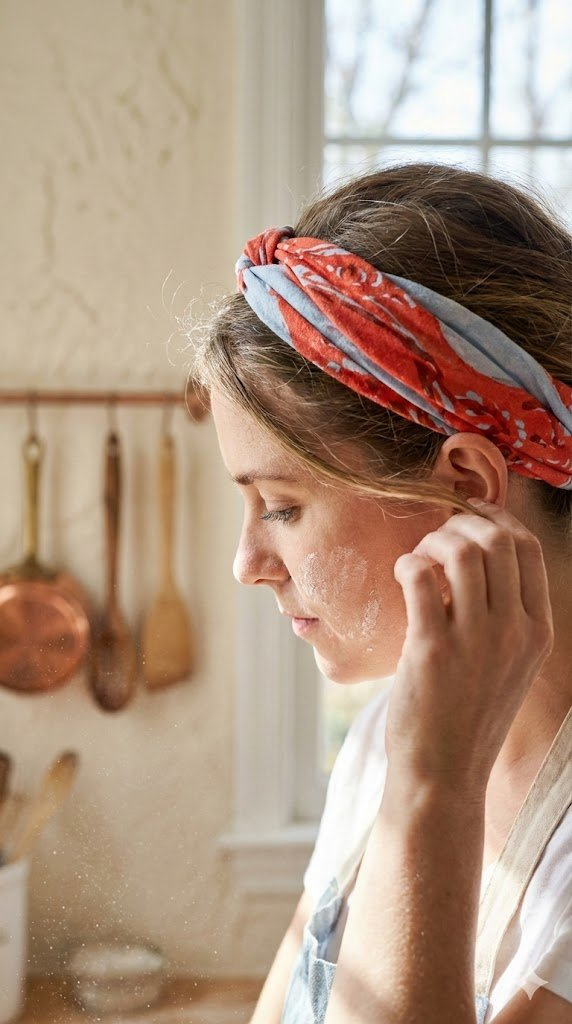 Colorful Baking Headwear Like Bandana Worn By Baker With Flour On Cheek In Bright Kitchen