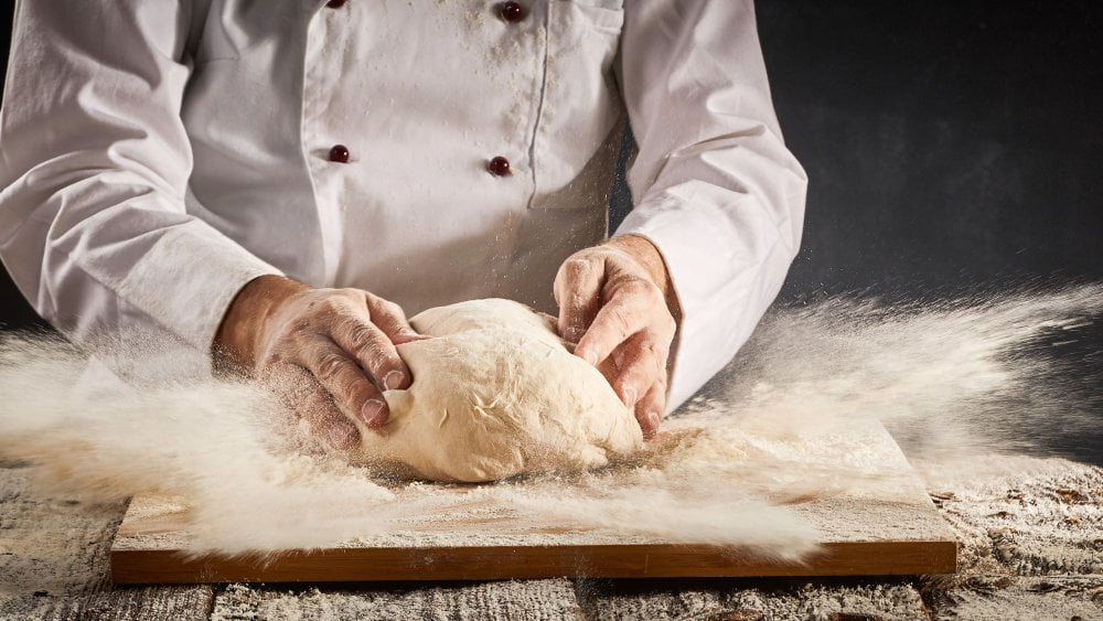 Hand Stretching Pizza Dough