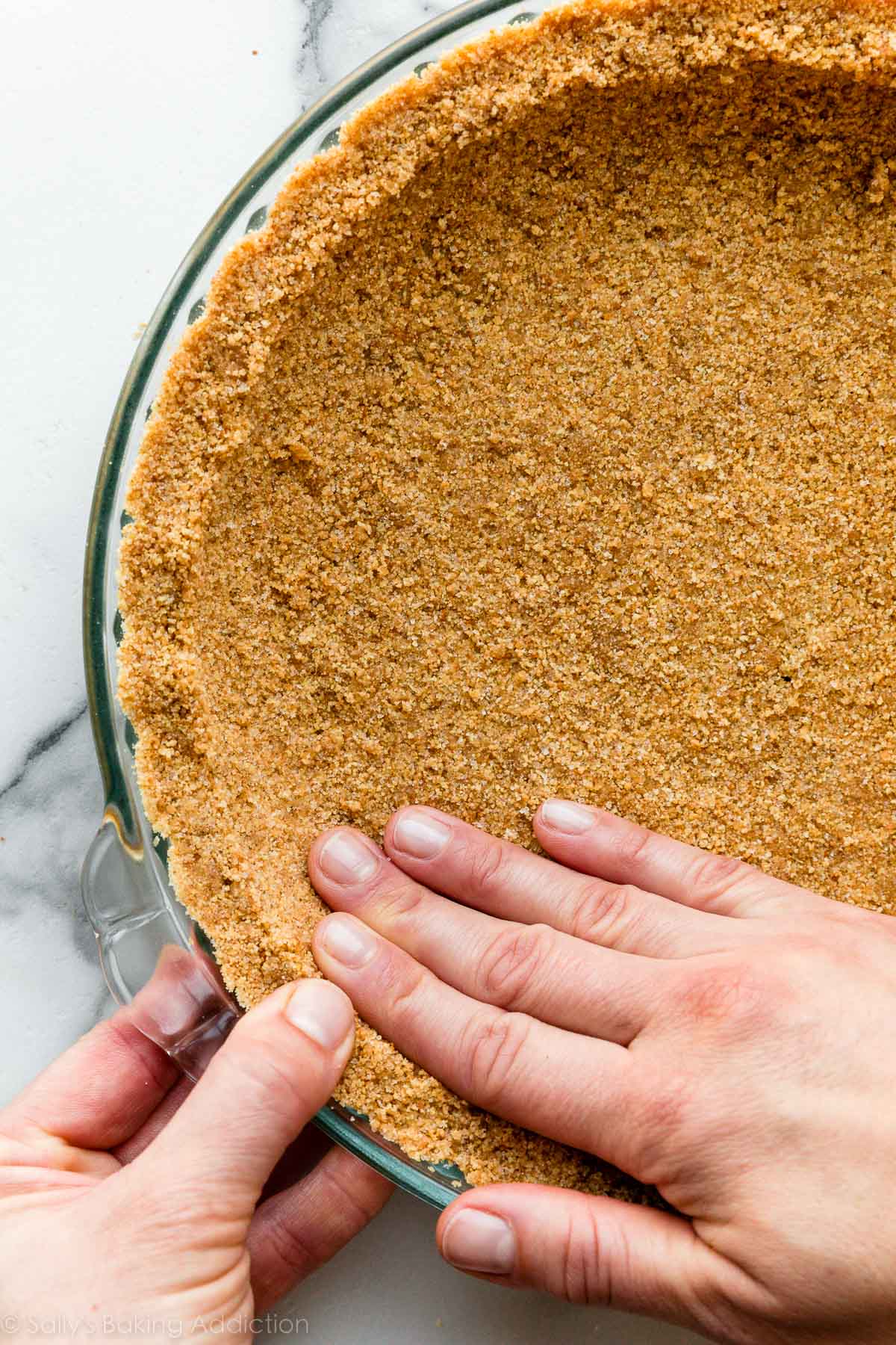 Pressing Graham Cracker Crust Into Pie Dish